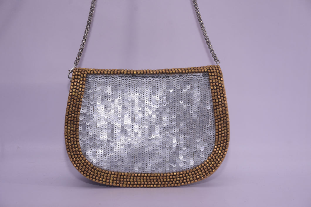 SEQUINNED X BODY WITH METAL BEADS